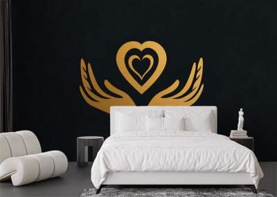 Two golden hands cradling a heart. Wall mural