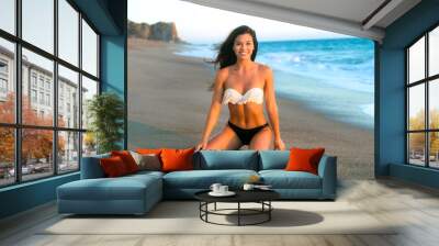 Beautiful attractive happy smile woman perfect body bikini beach sand ocean tropical model abs athletic single Wall mural