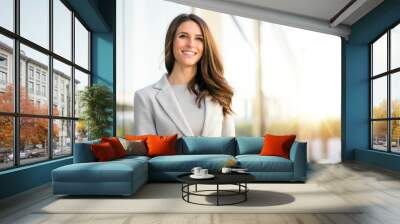 Bright sunny vibrant portrait of beautiful woman business executive style in downtown urban area Wall mural