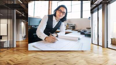 Busy asian male professional business executive creative professional while at work cubicle  Wall mural