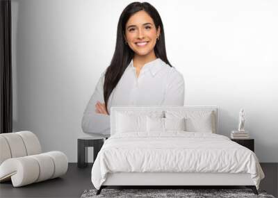 Cheerful brunette business woman student in white button up shirt, smiling confident and cheerful with arms folded, isolated on a white background Wall mural