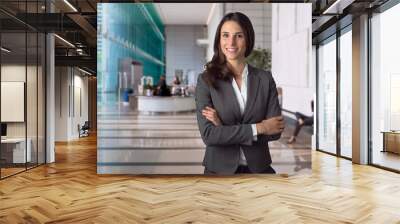 genuine natural sincere business manager portrait at large lobby area of bank in financial district Wall mural