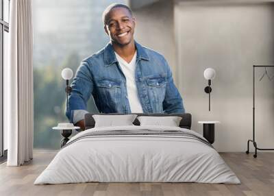 Portrait lifestyle head shot of an african american male in a blue jean jacket on a city urban rooftop, nice smile Wall mural