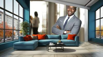 Smiling boss ceo at office work place portrait of worker in suit and tie looking handsome Wall mural