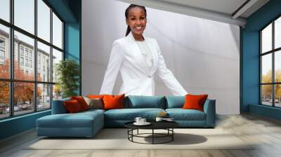 Smiling cheerful headshot portrait of an african businesswoman, corporate executive, business career professional, enthusiastic and upbeat	 Wall mural