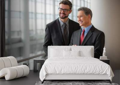 two businessmen smiling at the office Wall mural