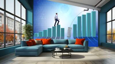 Business people jumping over bar charts Wall mural