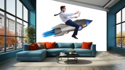 Businessman flying on rocket in business concept Wall mural