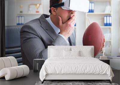 Businessman playing virtual reality football in office with VR g Wall mural