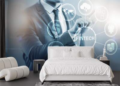 Businessman pressing buttons in fintech concept Wall mural