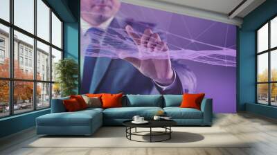 Businessman pressing virtual button in futuristic concept Wall mural