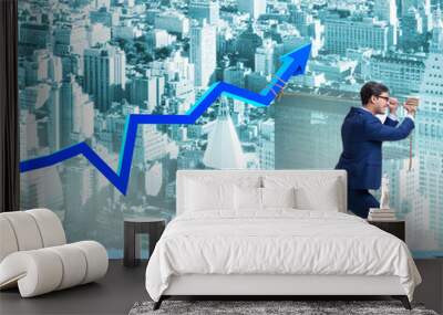 Businessman supporting increase in economy Wall mural