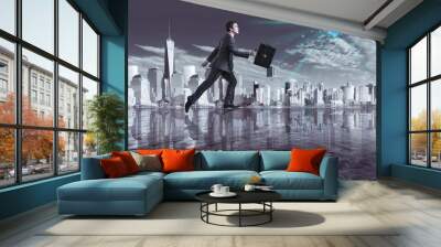 Businessman walking on the water towards dollar Wall mural