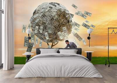 Businessman with money tree in business concept Wall mural