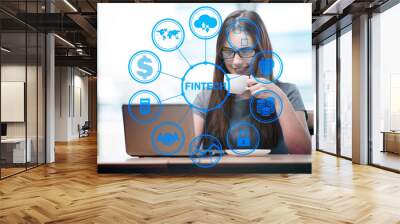 Businesswoman with computer in financial technology fintech conc Wall mural