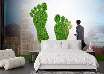 Carbon footprint concept with businessman Wall mural