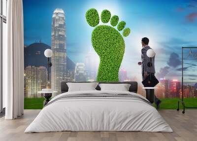 Carbon footprint concept with businessman Wall mural