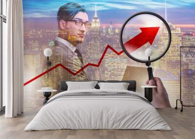 Concept of economic growth with chart and magnifying glass Wall mural