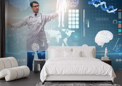 Doctor in futuristic medical concept pressing button Wall mural