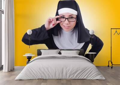 Funny nun isolated on the white Wall mural