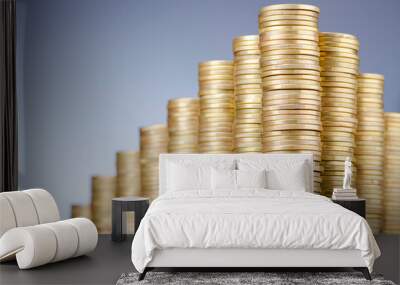 Golden coins in high stacks Wall mural