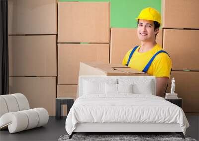 Man contractor working with boxes delivery Wall mural