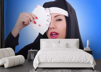 Nun playing cards on white Wall mural