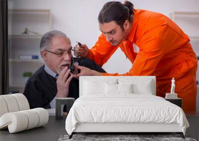 Old male judge meeting with young captive in courthouse Wall mural