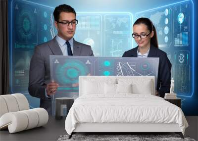 Pair of businessman and businesswoman discussing data Wall mural