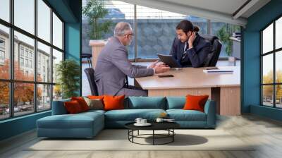 Two businessmen discussing business project Wall mural