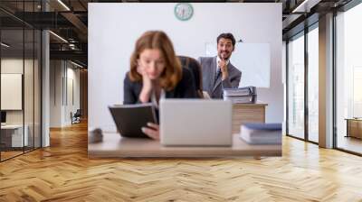 Two colleagues working in the office Wall mural