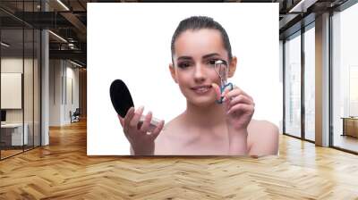 Woman in beauty concept applying make up using cosmetics Wall mural