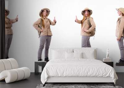 Woman wearing safari hat on white Wall mural