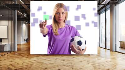 Woman with football pressing virtual buttons Wall mural