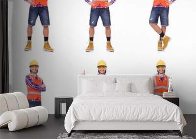 Young construction worker pressing vurtual button isolated on wh Wall mural