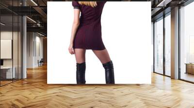 Young girl in leather hessian boots pressing virtual button Wall mural