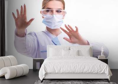 Young woman doctor isolated on white background Wall mural