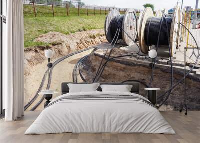 Close-up of electric cables on the ground in a construction site Wall mural