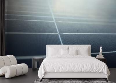 Solar panels on the roof of a tropical city house early in the morning at dawn. Wall mural