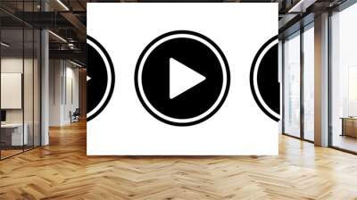 Play icon on black circle. Video player app concept Wall mural