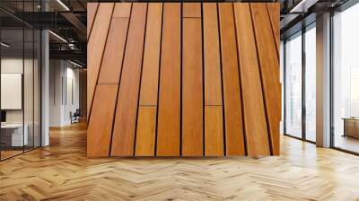 Close-up polished wooden decking showcasing rich grain patterns and warm tones in natural light Wall mural