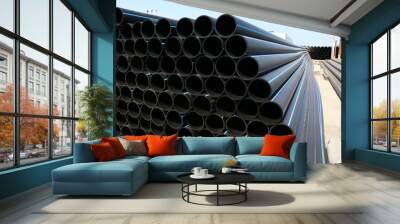 PE pipe plant, Industrial PE pipes with blue line for gas and water. HDPE pipe, Polyethylene PE100 pipe. Polyethylene pipe plant Wall mural