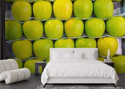 Background of some green apples for sale at a market Wall mural