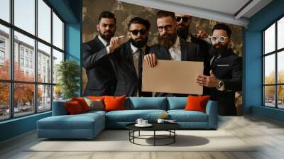 A group of dapper men in suits, gesturing with blank cardboard Wall mural