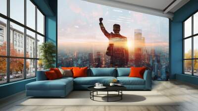 A successful businessman raises his hand in triumph, his image superimposed on a cityscape Wall mural