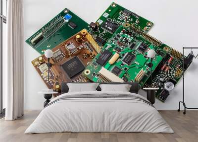 Assorted printed circuit boards with various components on white background Wall mural