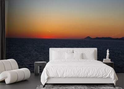 Greek sunsets over the Aegean sea during summer  Wall mural