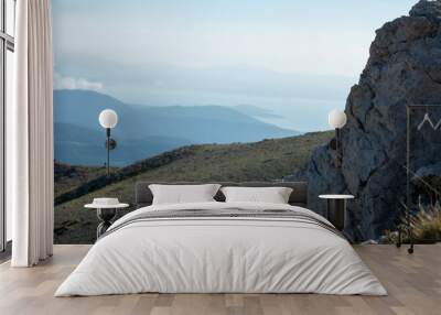 snowy peaks of mountains, clouds, wonderful and mystical landscapes Wall mural