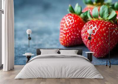 Strawberries on a red backdrop. Wall mural