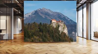 The picturesque Bled castle with the majestic Alps in the background Wall mural